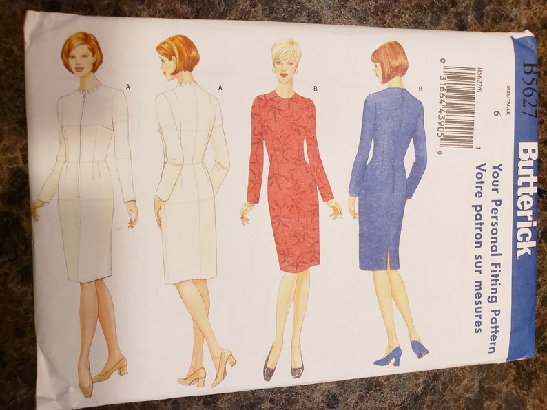 May include: A sewing pattern for a dress with three different styles. The pattern is from Butterick and is for size 6. The pattern includes instructions for a white dress, a red floral dress, and a blue dress.