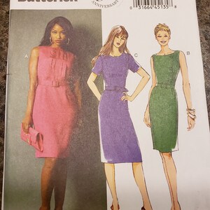 May include: A sewing pattern for three dresses. The pattern is for sizes 8-10-12-14-16. The dresses are sleeveless, short-sleeved, and long-sleeved. The pattern is from Butterick and is for their 150th anniversary.