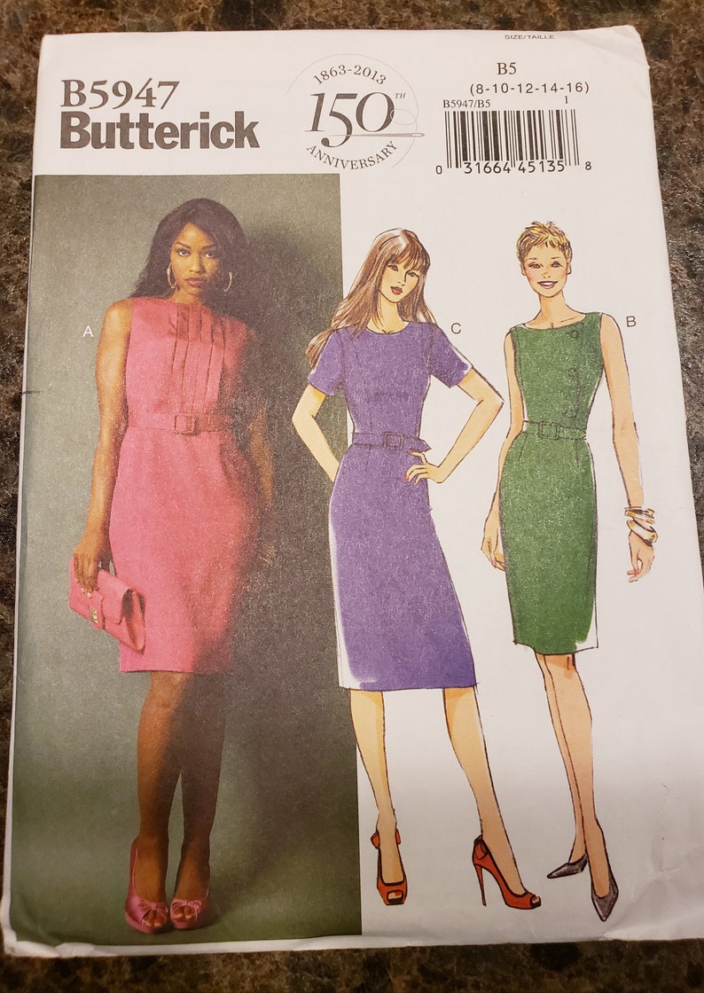 May include: A sewing pattern for three dresses. The pattern is for sizes 8-10-12-14-16. The dresses are sleeveless, short-sleeved, and long-sleeved. The pattern is from Butterick and is for their 150th anniversary.