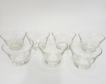 Set vintage di 7 ciotole da dessert in vetro trasparente