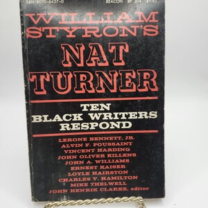 May include: A black and red paperback book titled "William Styron's Nat Turner: Ten Black Writers Respond". The book cover features the title in large, bold red letters. The author's name, "William Styron", is printed in smaller red letters above the title. The book's subtitle, "Ten Black Writers Respond", is printed in smaller white letters below the title. The book cover also includes the publisher's name, "Beacon", and the book's price, "$1.95".