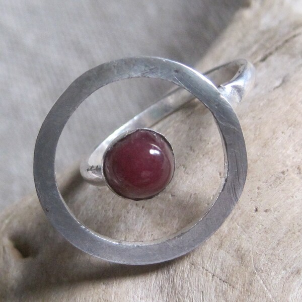 Geometric ruby floating ring.