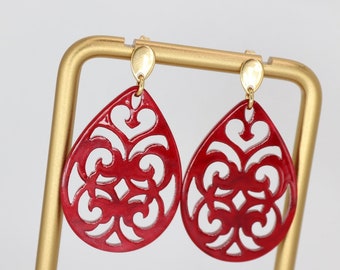 Earrings with romantic acrylic ornament in dark red