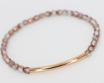 Glitzer- Armbänder aus facettierten Glasperlchen in rosé/ roségold