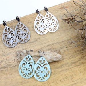 Stud earrings with romantic acrylic ornament in light turquoise, grey or white
