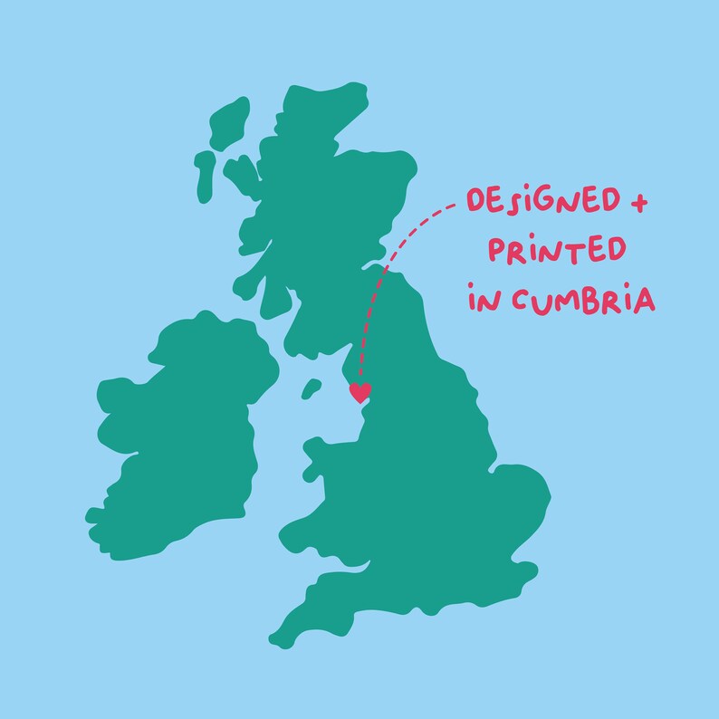 May include: A map of the United Kingdom with a red heart marking a location in Cumbria. The text "DESIGNED + PRINTED IN CUMBRIA" is written in red next to the map.