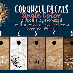 May include: Five different designs for cornhole decals. Each design features a wreath with a monogram and an established date. The decals are available in a single color of your choice. The text on the image reads "Cornhole Decals Single Color 2 Decals customized in the color of your choice (board not included)"