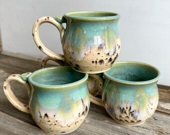 Ceramic mug handmade on the pottery wheel holds 16oz beach glaze