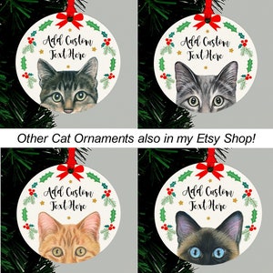 May include: Four round Christmas ornaments featuring different cat breeds. Each ornament has a white background with a green holly wreath and red berries. The text "Add Custom Text Here" is printed in gold on each ornament.