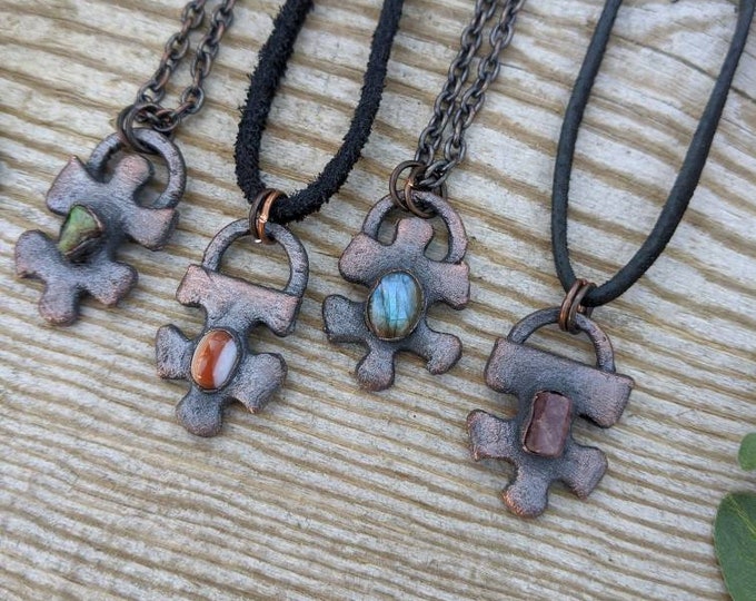 A piece of a puzzle pendant