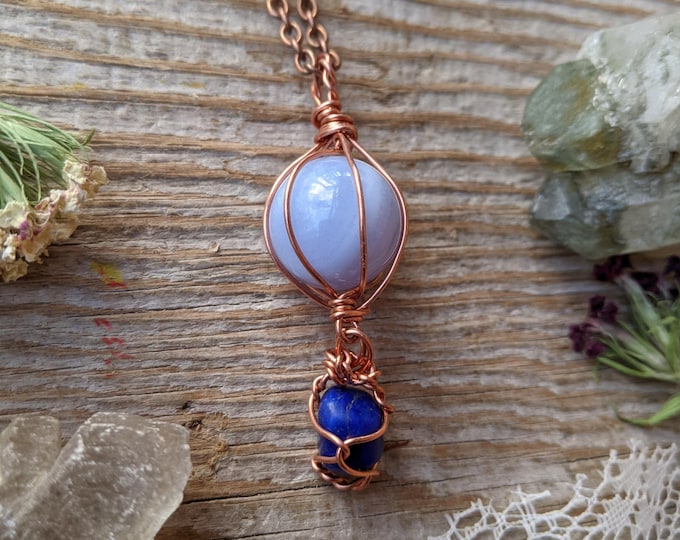 blue lace agate crystal sphere pendant with Lapis lazuli crystal below it, natural chalcedony crystal sphere, blue lace agate ball, lapis