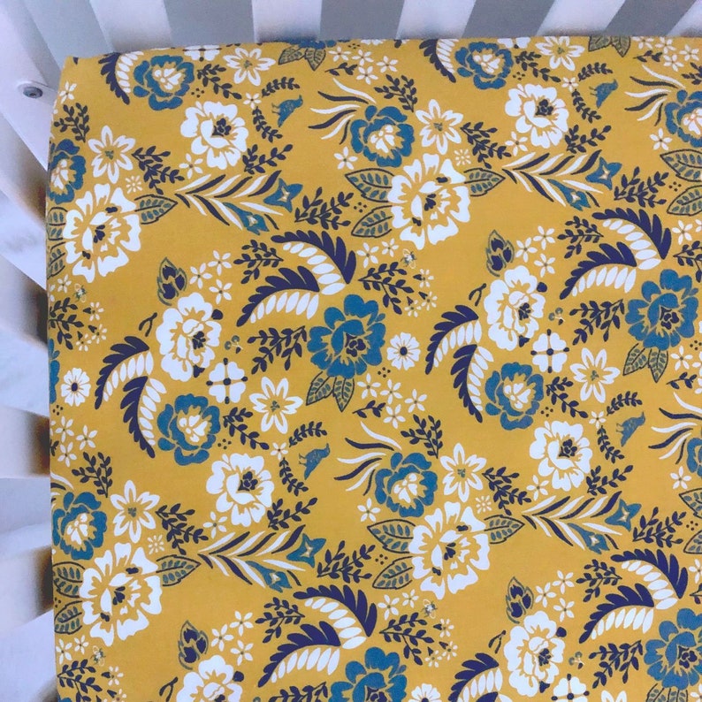 mustard yellow crib sheet