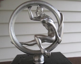 vintage satan in tire, speed demon, rolling devil car hood ornament