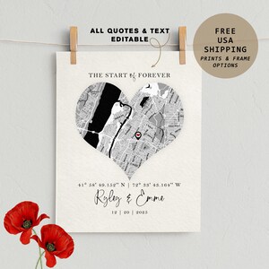 May include: A personalized print featuring a heart-shaped map, with the text "THE START of FOREVER." The print includes the names "Ryley & Emme" and a date. The print is held by a wooden clip, with red flowers in the corner.