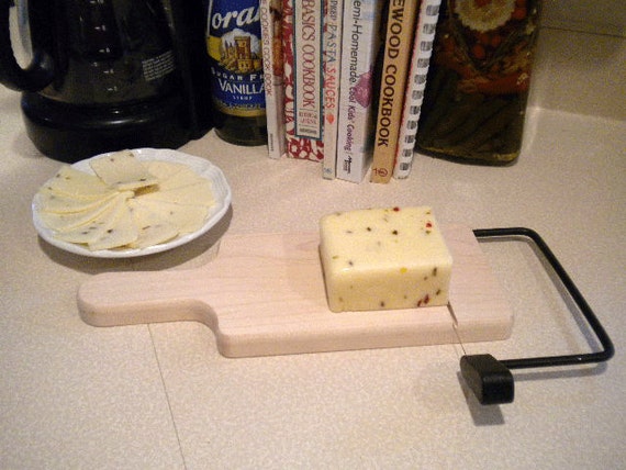 32. Hand-made Cheese Slicer 