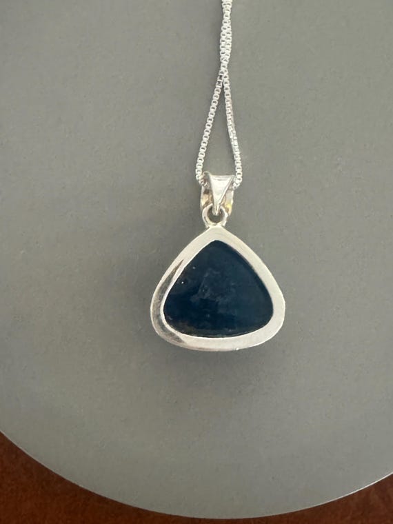 A deep blue rounded triangular shaped cavensite p… - image 5