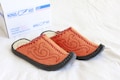 Mongolian Felt Slippers, shiny orange, leather sole, camping, aladdin style fur shoe, halloween gift idea, birthday, funny, crazy, amazing product logo
