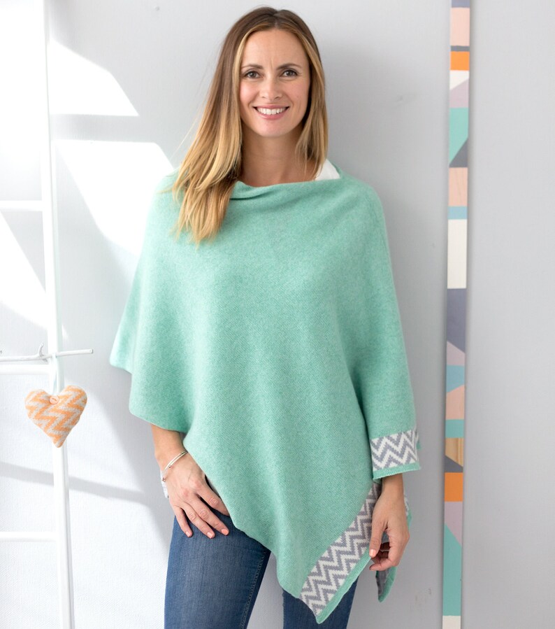 Luxury British Knitwear. Knitwear wool cardigan Knitted cape Knitted lambswool poncho geometric pattern detail