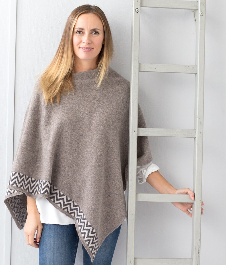 Luxury British Knitwear. Knitwear wool cardigan Knitted cape Knitted lambswool poncho geometric pattern detail
