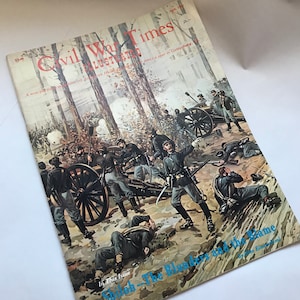 May include: A vintage magazine cover illustration depicting a Civil War battle scene. The cover features a group of soldiers firing cannons in a wooded area. The magazine title is "Civil War Times Illustrated" and the text "In This Issue Shiloh - The Blunders and the Fame" is visible at the bottom of the cover.