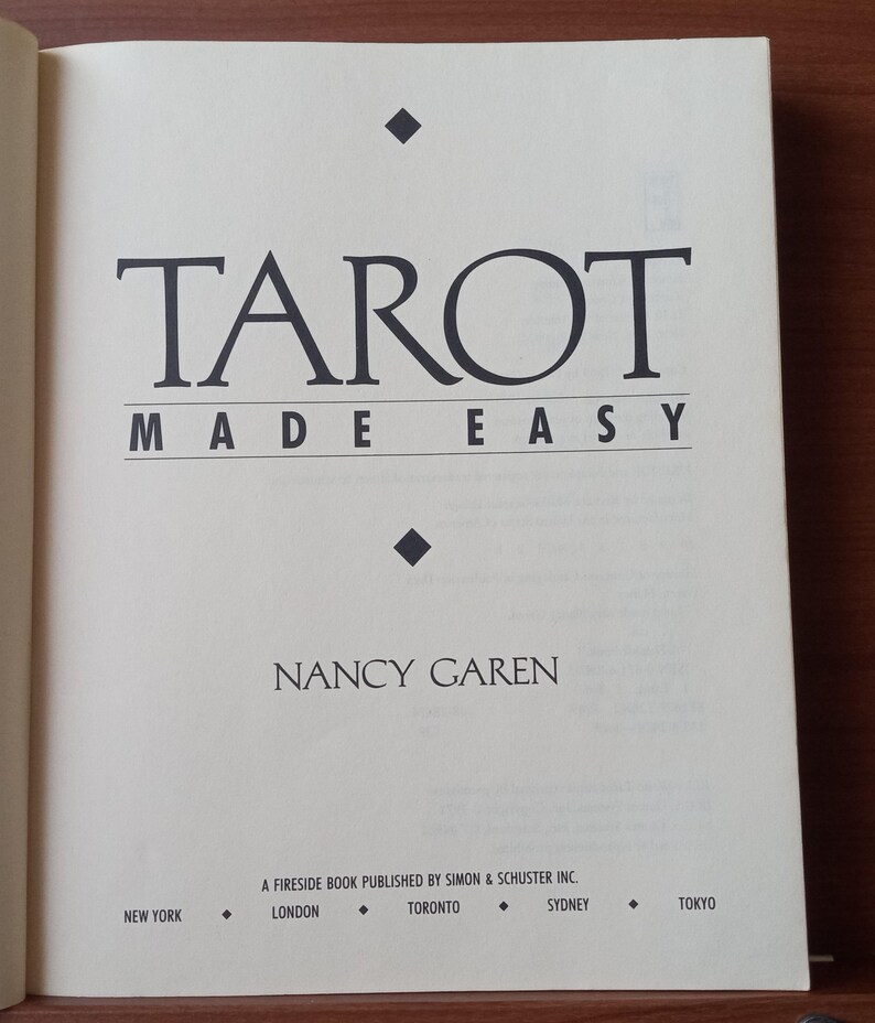 May include: Book cover with the title "Tarot Made Easy" by Nancy Garen. A Fireside book published by Simon & Schuster Inc. with locations New York, London, Toronto, Sydney, and Tokyo.