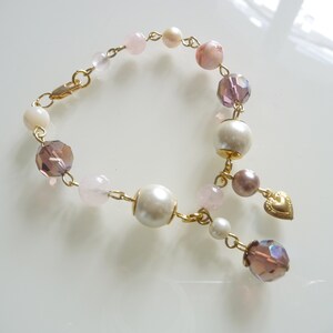 Beaded bracelet, pink bracelet with charms. image 1