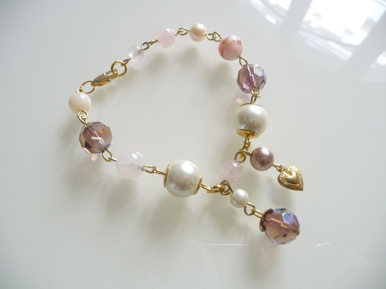 Beaded bracelet, pink bracelet with charms. image 1