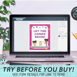 May include: A laptop screen displaying a pink and purple printable sign with the text "Let the Games Begin!" and three cartoon girls doing gymnastics. The sign is surrounded by stars. The laptop is on a wooden table with a plant and a pencil holder in the background.
