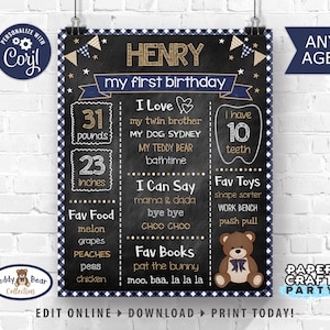 May include: A chalkboard style first birthday sign for a boy named Henry. The sign is decorated with blue and gold accents and features details about Henry's first year, including his weight, height, favorite foods, toys, and books. The sign also includes a cute teddy bear illustration.