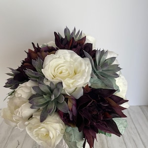 Bridal bouquet in white and plum with succulents