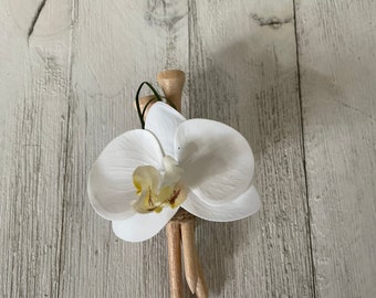 ゴルフをテーマにしたブートニアと白いリアルタッチの蘭