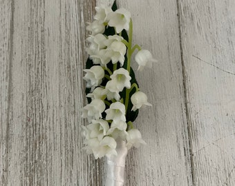 Boutonniere designed with Lily of the Valley