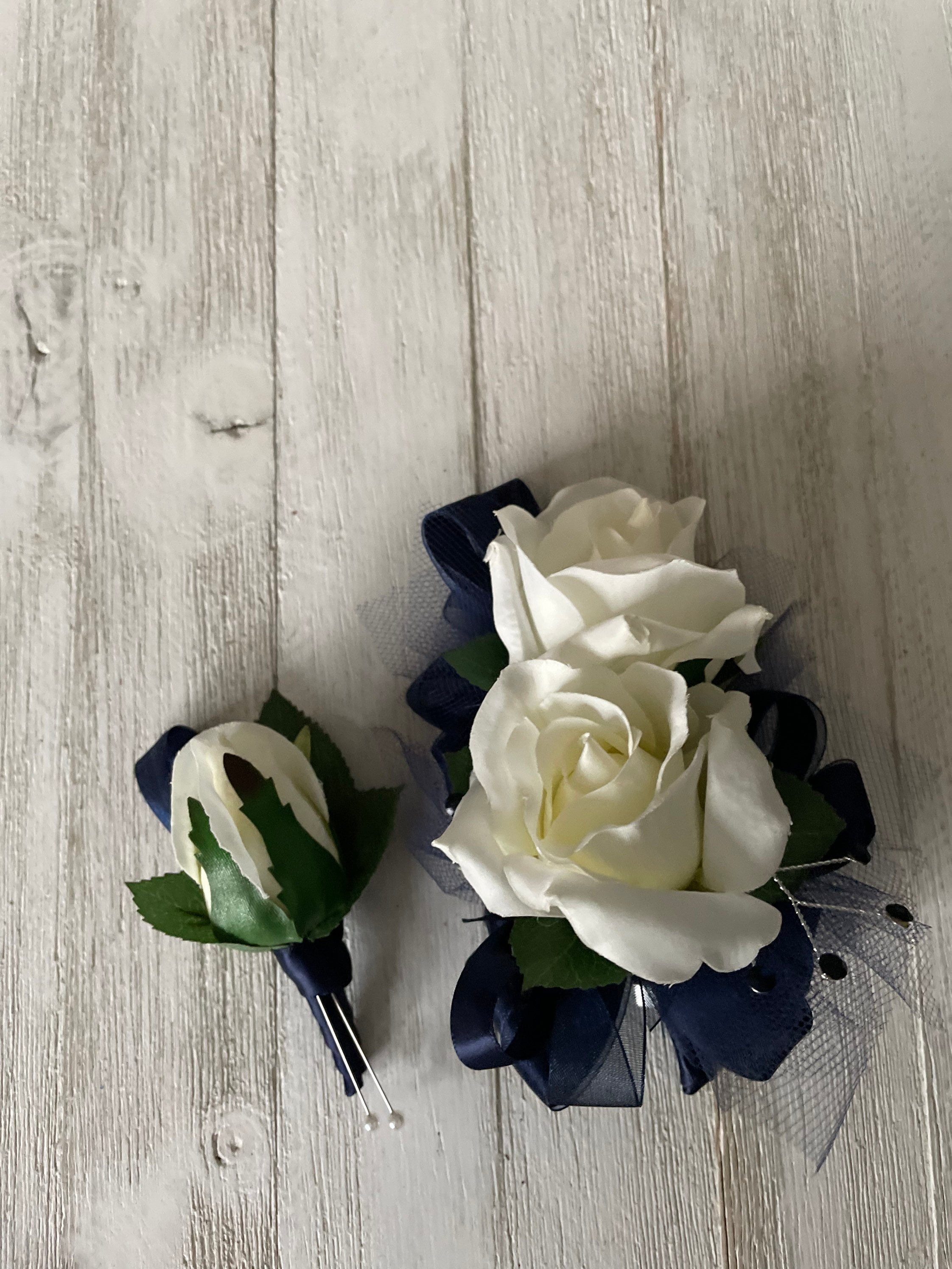 White Rose Boutonniere With Blue Ribbon