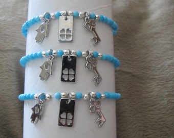 Turquoise bracelet with 3 charms