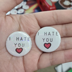 I HATE YOU pin back button, zipper pull, scaryish podcast design plain or holographic