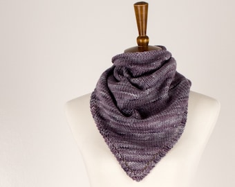 May include: A purple and gray striped knitted scarf with a scalloped edge, displayed on a white mannequin.
