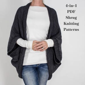 May include: A dark gray knitted shrug with wide sleeves. The shrug is worn over a white long-sleeved shirt and blue jeans. Text on the right side reads "4-in-1 PDF Shrug Knitting Patterns."