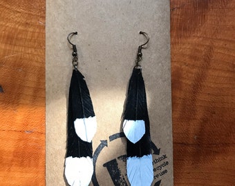 HUIA feather earrings made from upcycled bicycle inner tube