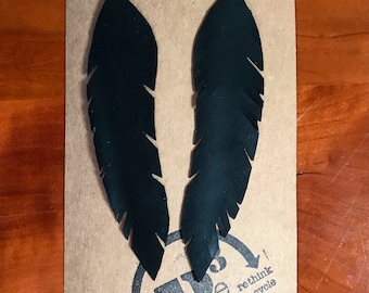BLACKBIRD  feather earrings made from up cycled bicycle inner tube.