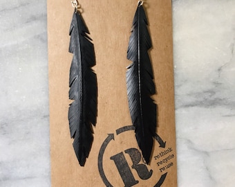 TRIBAL RAVEN  feather earrings made from up cycled bicycle inner tube.