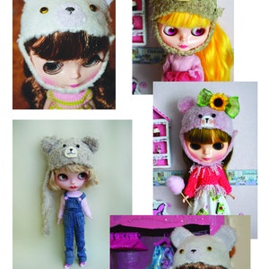 May include: Four Blythe dolls wearing different bear-themed hats. The dolls are wearing various outfits, including a pink dress, a denim overall, and a white sweater. The dolls are all looking at the camera.