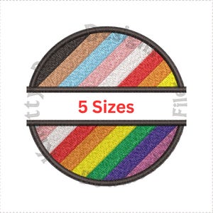 May include: A round embroidery design featuring a rainbow flag with a white banner that says "5 Sizes".