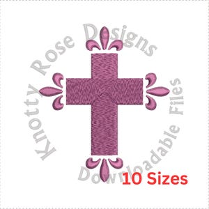 May include: Pink cross with decorative flourishes, surrounded by a circle with the text "Knotty Rose Designs Downloadable Files 10 Sizes".