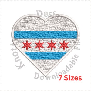 May include: A heart-shaped patch with the Chicago flag. The flag is white with two blue horizontal stripes and four red six-pointed stars.
