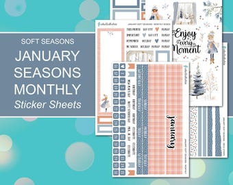 May include: A collection of sticker sheets with a winter theme. The sheets feature illustrations of winter scenes, decorative elements, and calendar stickers. Text includes "January", "Enjoy Every Moment", and "Soft Seasons". The color palette includes blue, peach, and white.