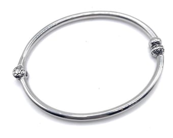 Pulseira rígida articulada Brighton com pingente - 5034
