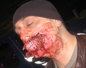 Zombie Runs! Upper & Lower Gums Jaw Exposed.Zombie Torn off mouth Latex Prosthetic. Very detailed Gums.Free Muscles and Thick Blood Jar.