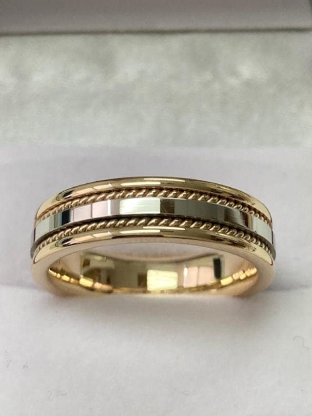 White and yellow gold braided wedding band