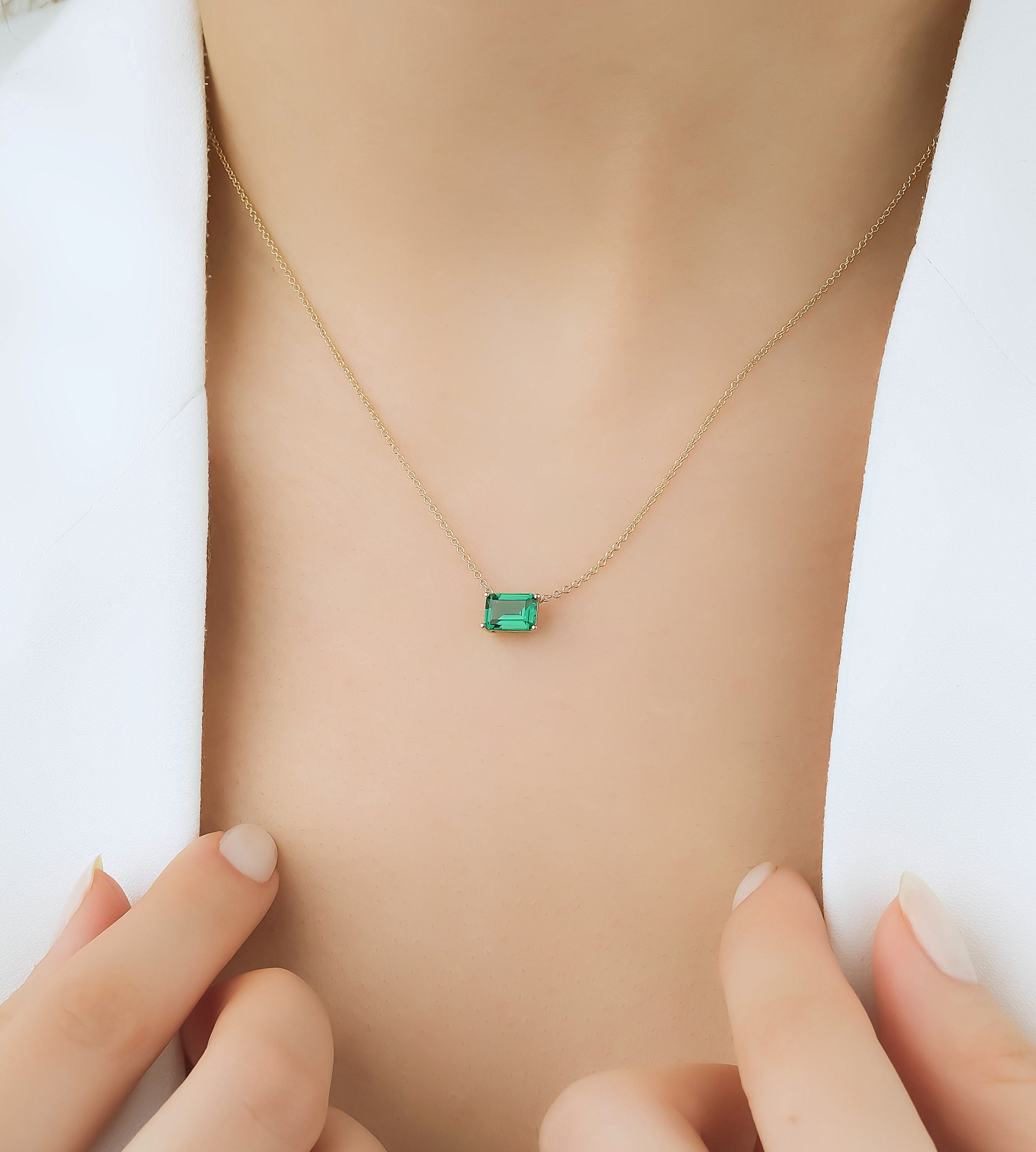 Emerald cut emerald pendant deals