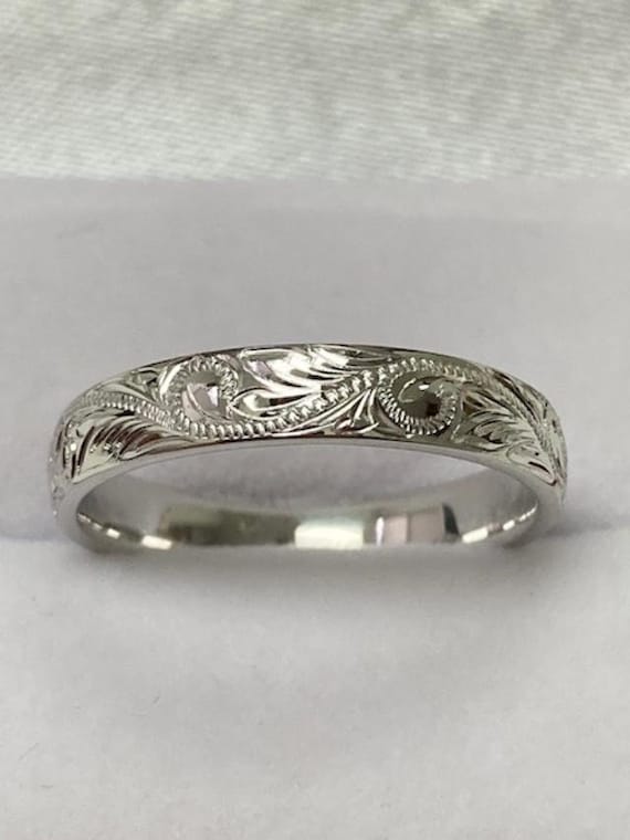 Engraved platinum on sale wedding band